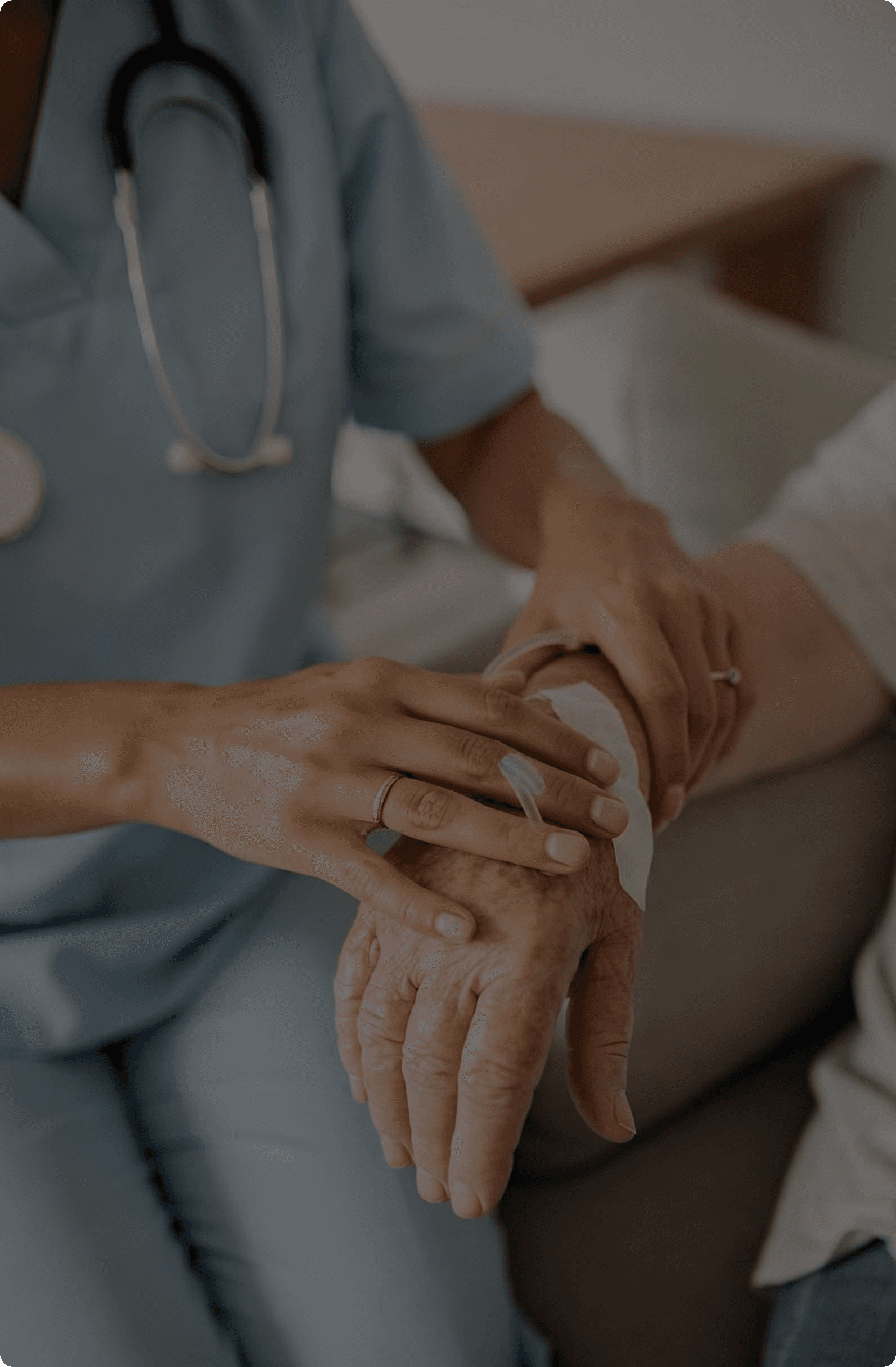 Healthcare professional supporting a patient